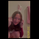 Emi dresses as an Easter bunny in a tutu and bunny ears, bends over and lays her rotten eggs on the floor, then shows off the turds up close. Vertical format video. Over 2.5 minutes.